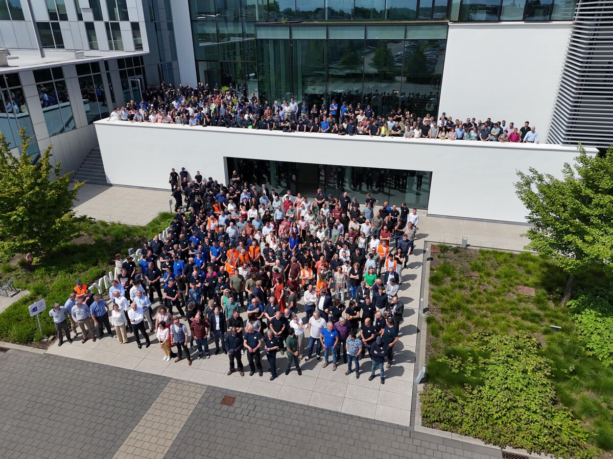 Fotografie de grup la reynaers Campus.