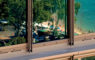 Reflective ConceptSystem 77 windows of the Estoril Sol Residence complex in Cascais, Portugal.